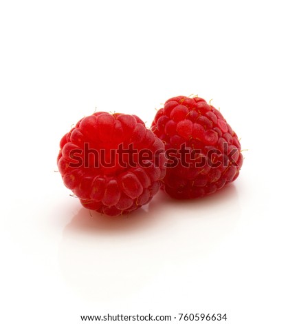 Red raspberry isolated on white background two whole and fresh
