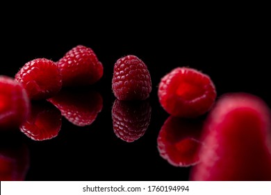  Red raspberry  on black background