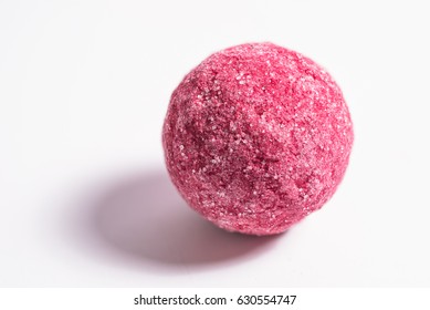 Red Raspberry Truffle Coated In Sugar On White Background