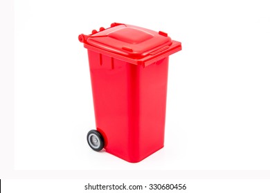 The red recycling bin on white background