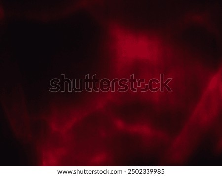 Red reflection in the dark for mysterious abstract background.        