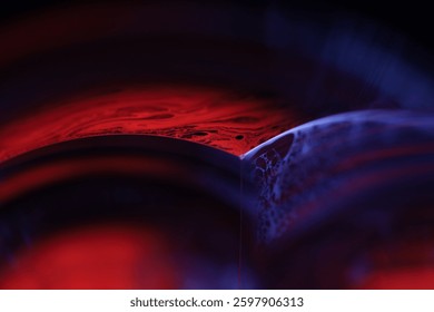 Red reflections of liquid in macro, red liquid surface, bubbles in macro, connection of bubbles in macro, cell from liquid, horror background