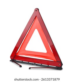 Red reflective traffic warning triangle isolated on white