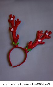 A Red Reindeer Head Band