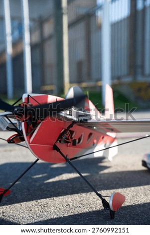 Red Remote Control Model Airplane on Ground, RC plane