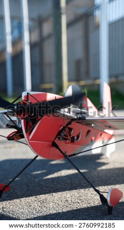 Red Remote Control Model Airplane on Ground, RC plane