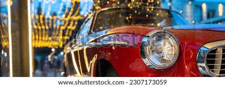 Red retro car on the showcase