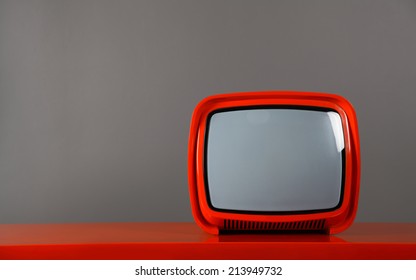 Red Retro TV On A Red Table