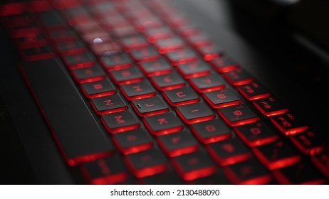 Red RGB Laptop Keyboard Keys Close Up