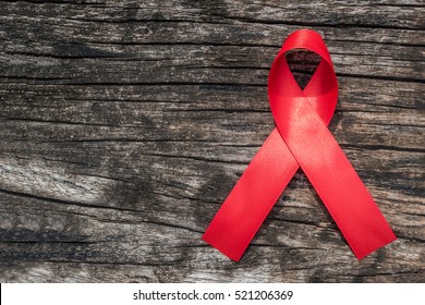 Red Ribbon Awareness For World Aids Day And National HIV/AIDS And Aging Awareness Month Concept Campaign 