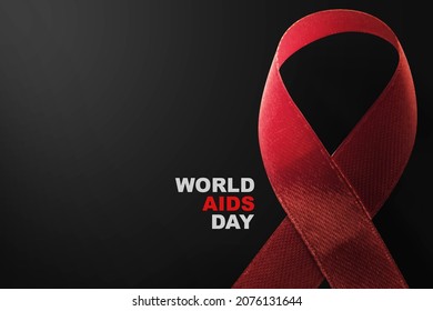 Red Ribbon With A Black Background. Hiv Aids Ribbon Awareness