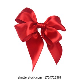 Red ribbon bow isolated on white background including clipping path - Shutterstock ID 1724723389