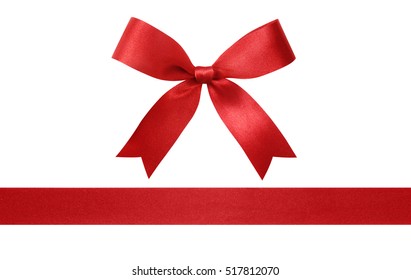 Red ribbon with bow isolated on white background. - Shutterstock ID 517812070