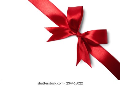 Red ribbon bow on white background. studio shot - Shutterstock ID 234465022