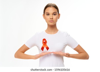 Red ribbon girl white t-shirt charity fund - Shutterstock ID 1596105616