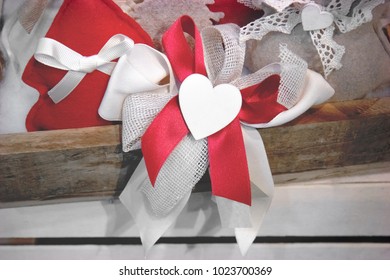 red ribbon love symbol, decoration with hearts and ribbons