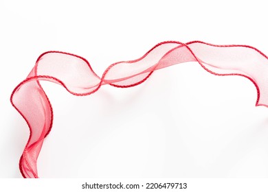 red ribbon on white background - Shutterstock ID 2206479713