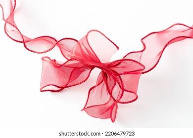 red ribbon on white background - Shutterstock ID 2206479723