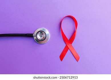 Red ribbon, stethoscope on the purple background. Woman breast cancer concept. Top view. - Powered by Shutterstock