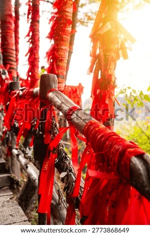 Red ribbons or strings used as blessing in buddhism.