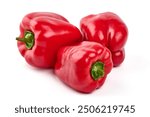 Red ripe bell peppers, isolated on white background