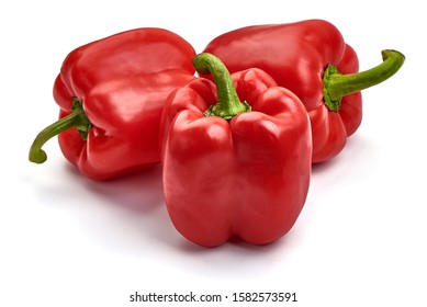 Red ripe bellpeppers, isolated on white background.