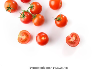 Red Ripe Cherry Tomatoes On White Background. Top View