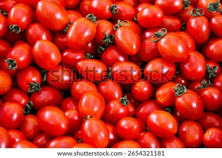 Red ripe small multiple cherry tomatoes