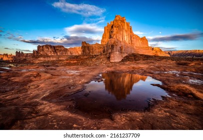 Red rock in the canyon. Beautiful red rock canyon landscape. Rock in red canyon landscape. Red rock reflection in water in canyon