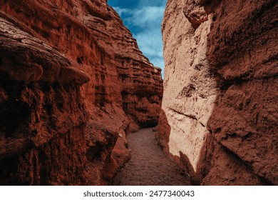 Red rock canyon, narrow passage between rocks - Powered by Shutterstock