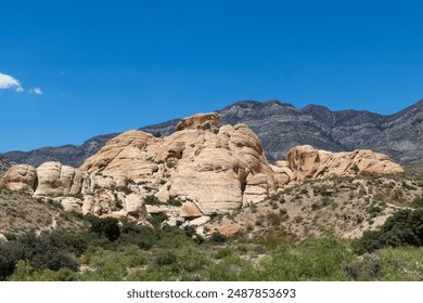 Red Rock Canyon Nevada Great Canyon Arizona moutains deserts some trees grass sand red yellow orange rocks blue sky no clouds summer sunny day landscape nice view  - Powered by Shutterstock