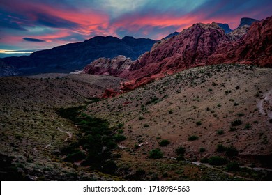 Red Rock Canyon State Park in Las Vegas, Nevada USA at dusk under a pink cloud filled sky. - Powered by Shutterstock