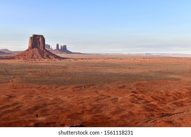 The Red Rock Desert Landscape Of Monument Valley, Navajo Tribal Park In The Southwest USA In Arizona And Utah, America