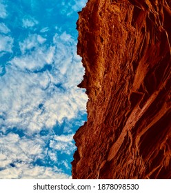 Red Rock Face On Singing Sands Beach In PEI, Canada.