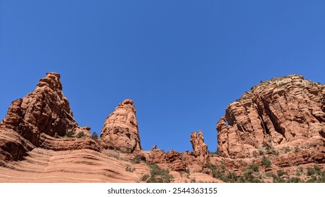 red rock formations against clear blue sky - Powered by Shutterstock