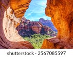 The red rock formations of Sedona glow brilliantly under the warm hues of the setting sun