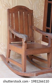 The Red Rocking Chair In The Corner Of The House