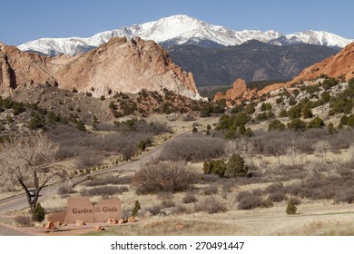 Red Rocks At Garden Of The Gods In Colorado Springs With Pikes Peak In Background.