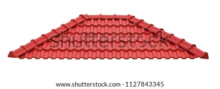 Red roof made of metal tiles isolated on white background. Can be used for design.