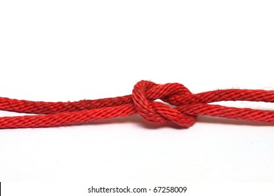 Red Rope With A Knot Isolated On White