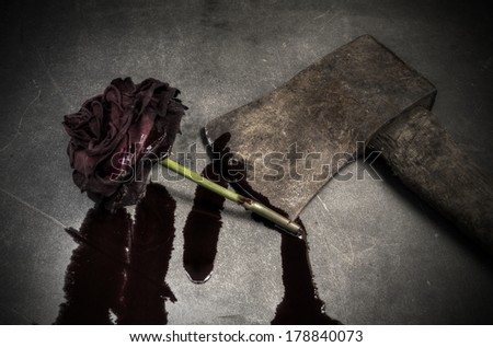 red rose and axe
