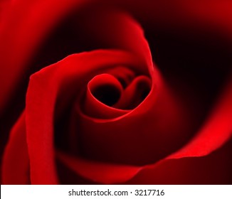 Red rose with heart symbol in center. close-up #1 - Powered by Shutterstock