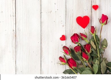 Red roses and hearts on old white wood table/Valentines day background - Shutterstock ID 361665407