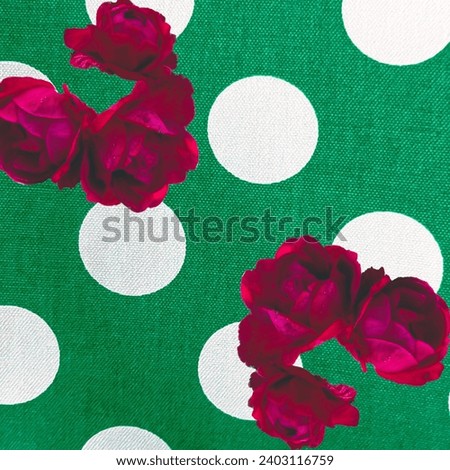 Red roses on Green dotty back