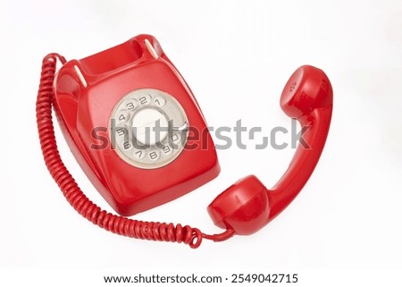 Similar – An old red telephone over red background