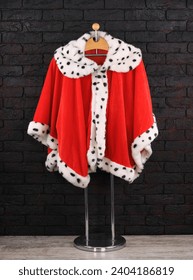 red royal robe on a hanger