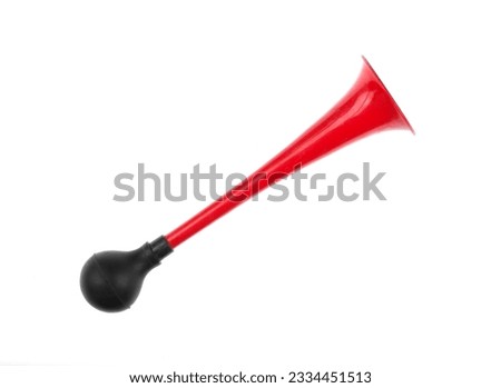 red rubber bicycle horn isolated on white background