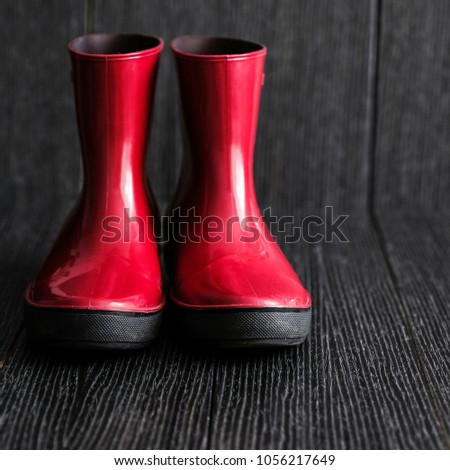 Similar – rubber boot meetings Boots