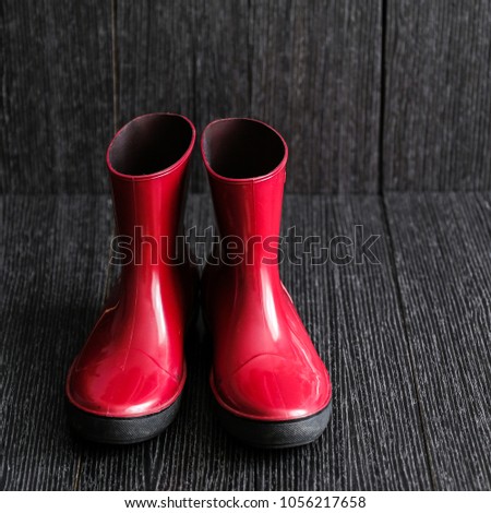 Similar – rubber boot meetings Boots