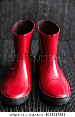 Similar – rubber boot meetings Boots